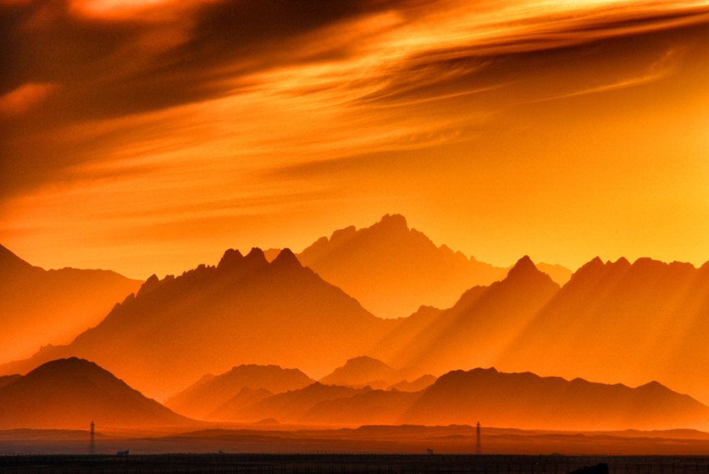 orange sunset with mountains